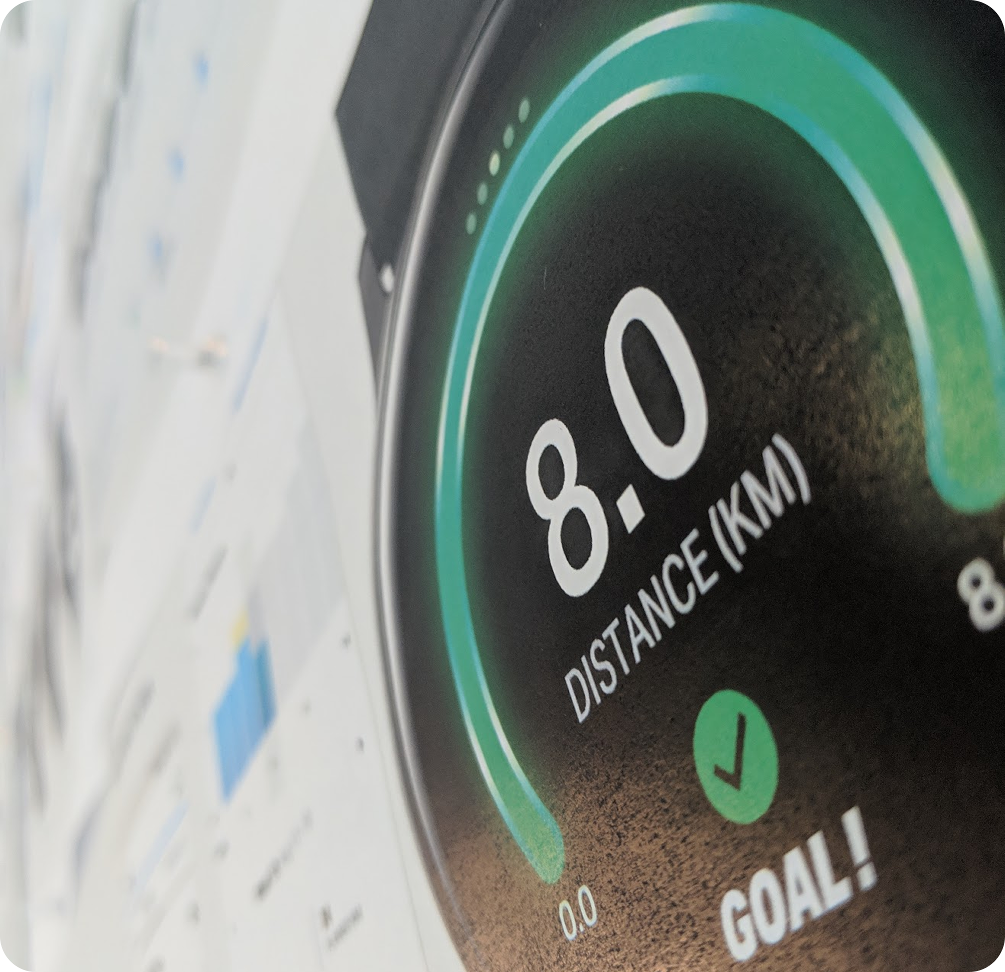 Close-up of the Galaxy Watch screen showing a completed distance goal